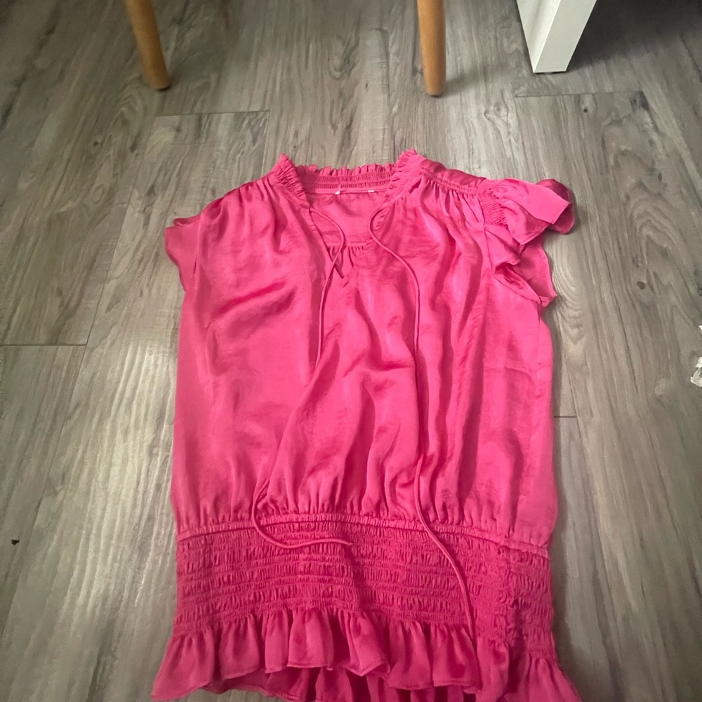 Never work cute silky top, goes pretty much with everything. M size .
